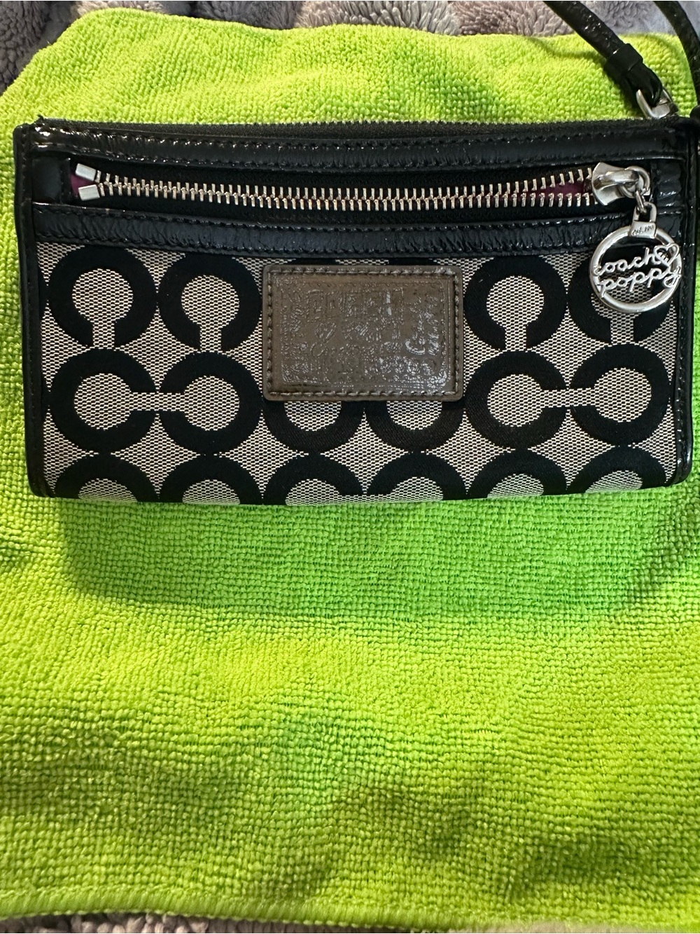 Coach poppy  Black and Cream Signature C Jacquard Wristlet with Silver Charm